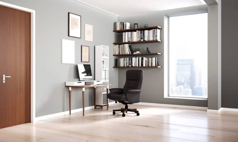 Modern home office with an ergonomic leather recliner chair, bookshelf, and a desk near a large window.